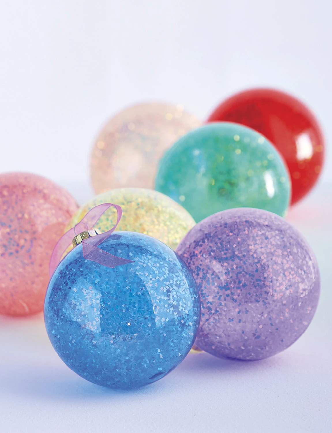 Raz 4.5" Set of 7 Rainbow Glittered Glass ball Christmas Ornaments 4224623 Raz 4.5" Set Of 7 Rainbow Glittered Glass Ball Christmas Ornaments 4224623 -The Jolly Christmas Shop 4224623 32913.1649792822